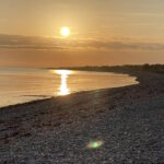 Solnedgang på stranden